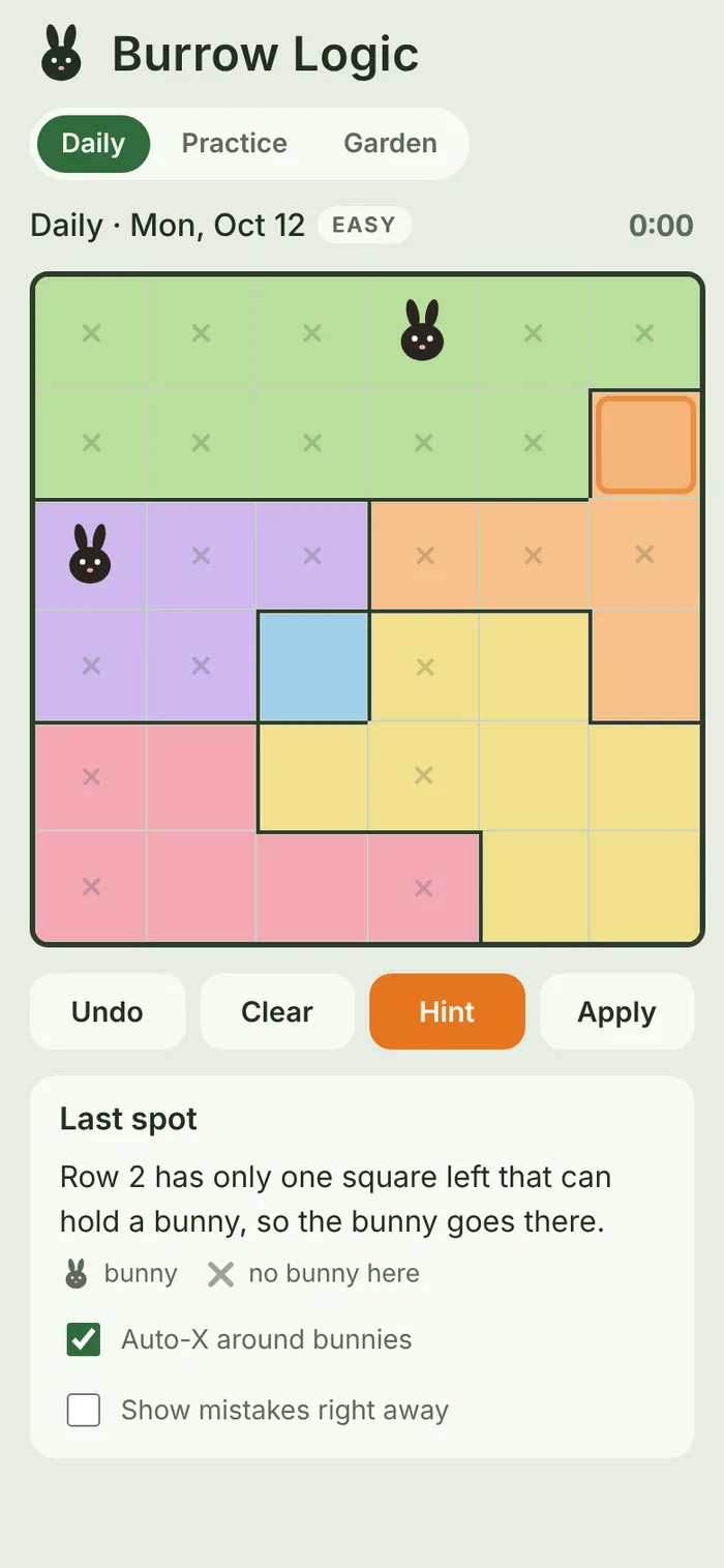 A Burrow Logic puzzle with the Last spot hint showing: row 2 has only one square left that can hold a bunny, so the bunny goes there.